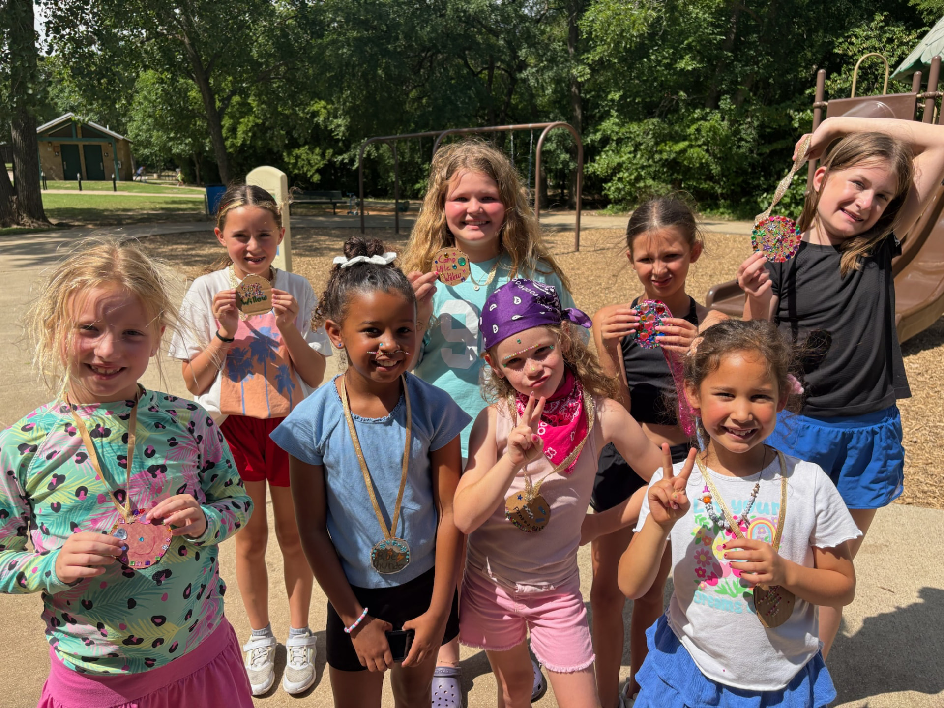 Showing off our camp medals